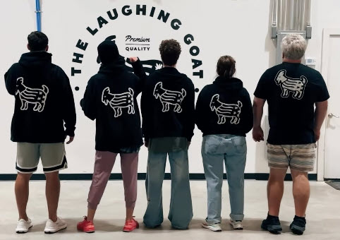 Rooted in people group photo of goat family